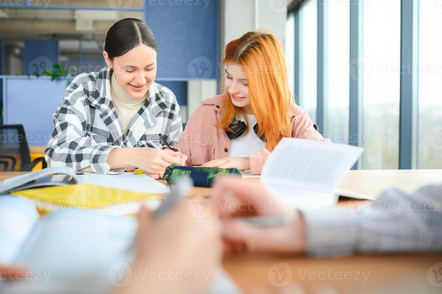 Students studying in library or classroom photo