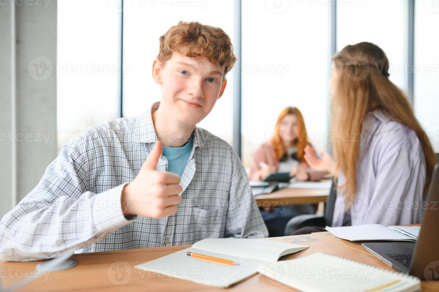 Students studying in library or classroom photo