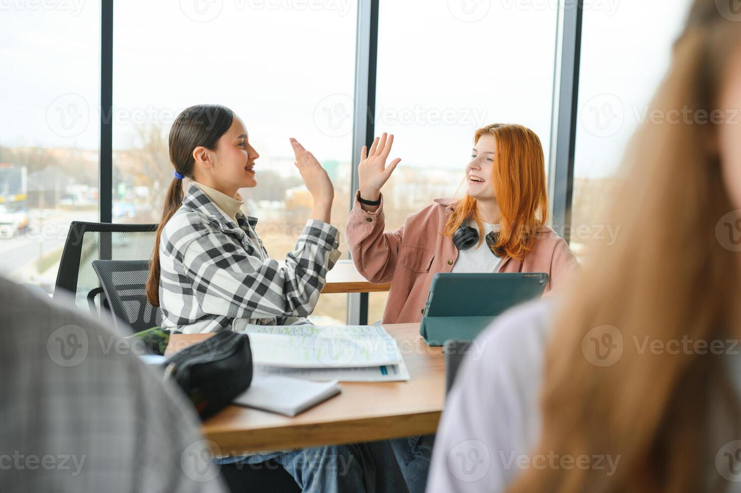 Students studying in library or classroom photo