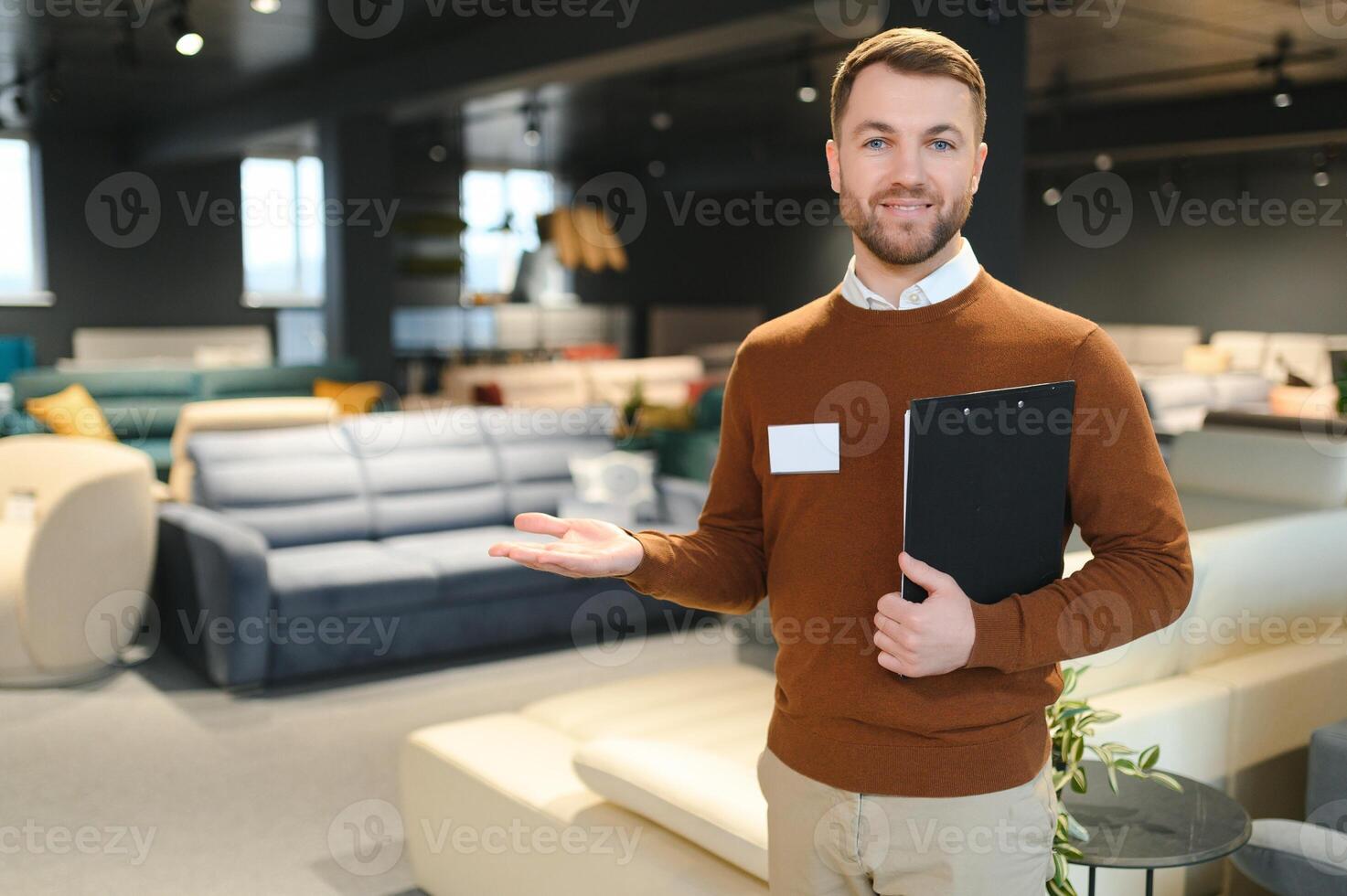 Sales assistant in furniture store photo