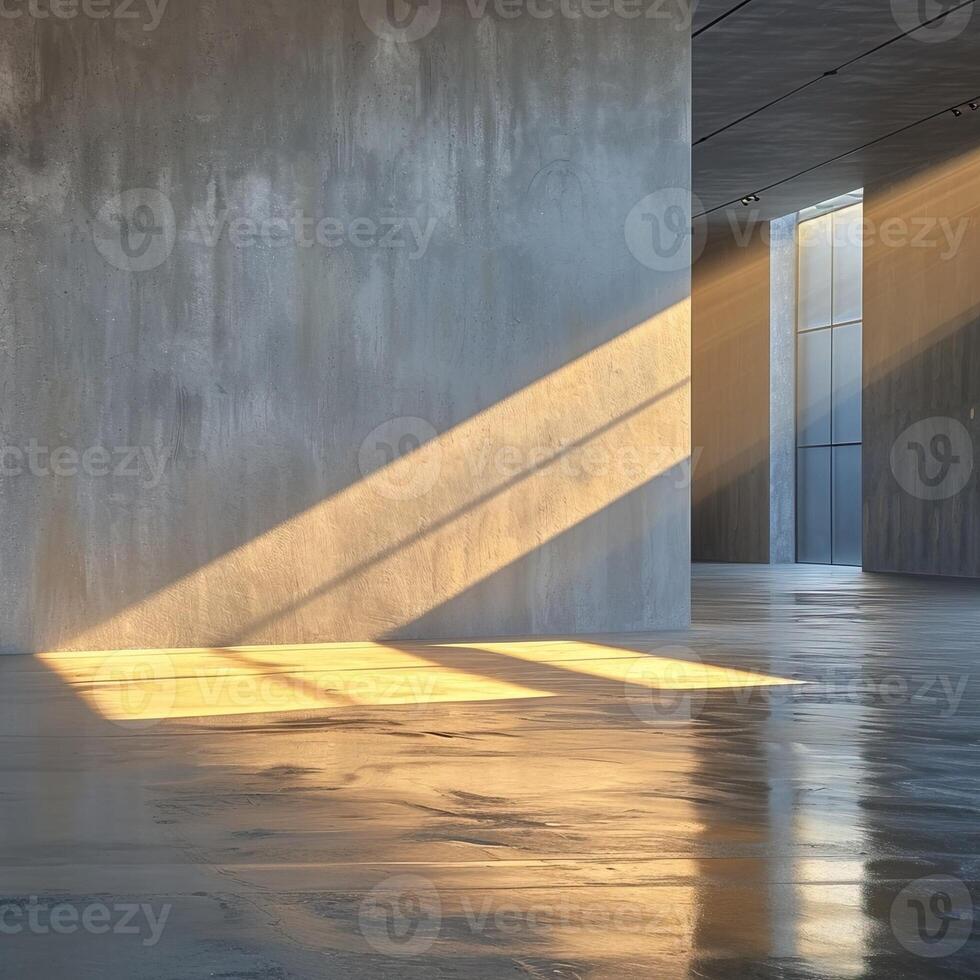 A minimalist interior featuring concrete walls and polished floors illuminated by sunlight, ideal for modern design concepts and architectural inspiration. photo