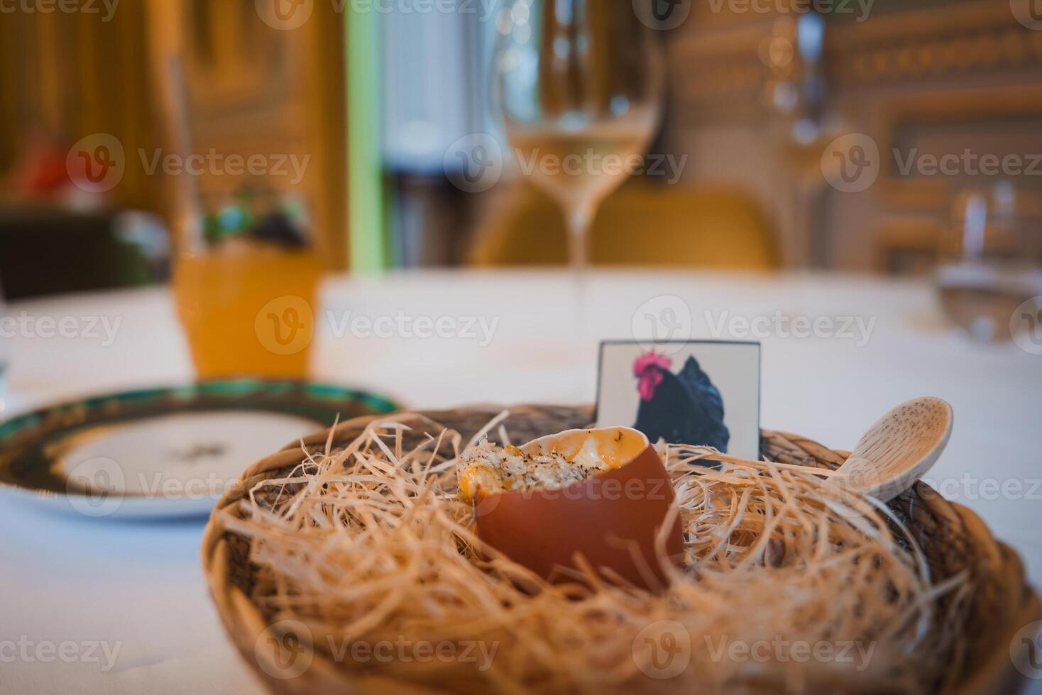 Luxurious Dining Setup with Creative Eggshell Dish in High-End Hotel Restaurant photo
