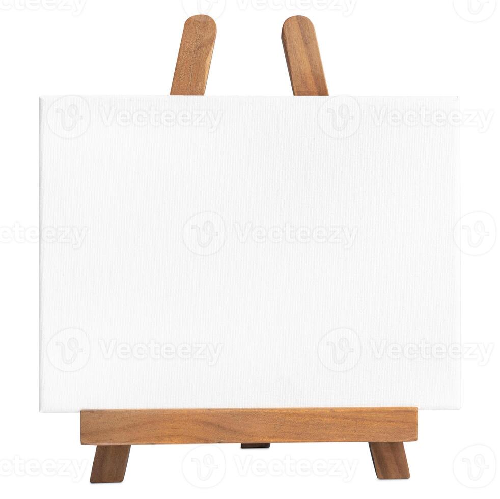 Blank white canvas on Wooden easel isolated on white background photo