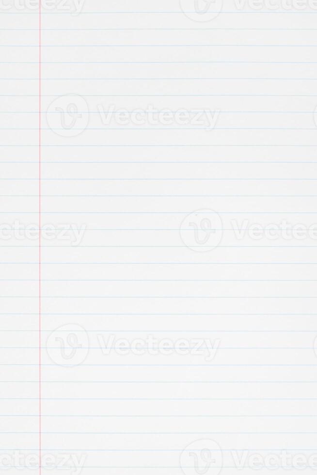 Blank lined paper background. Blue lines and red margin. Full frame photo
