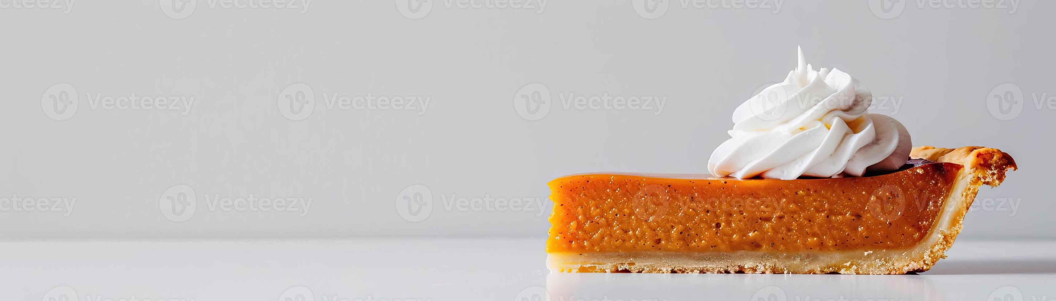 A minimalist, high-key setup with a slice of pumpkin pie, its whipped cream topping pristine and inviting, set against a crisp, white background, broad empty space on the right for photo