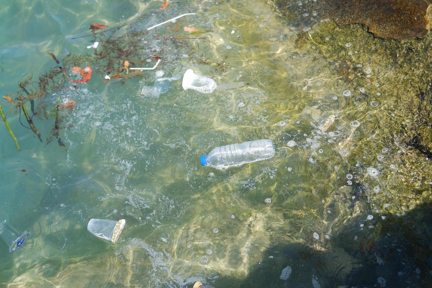 plastic waste on the beach, closeup of photo with soft focus