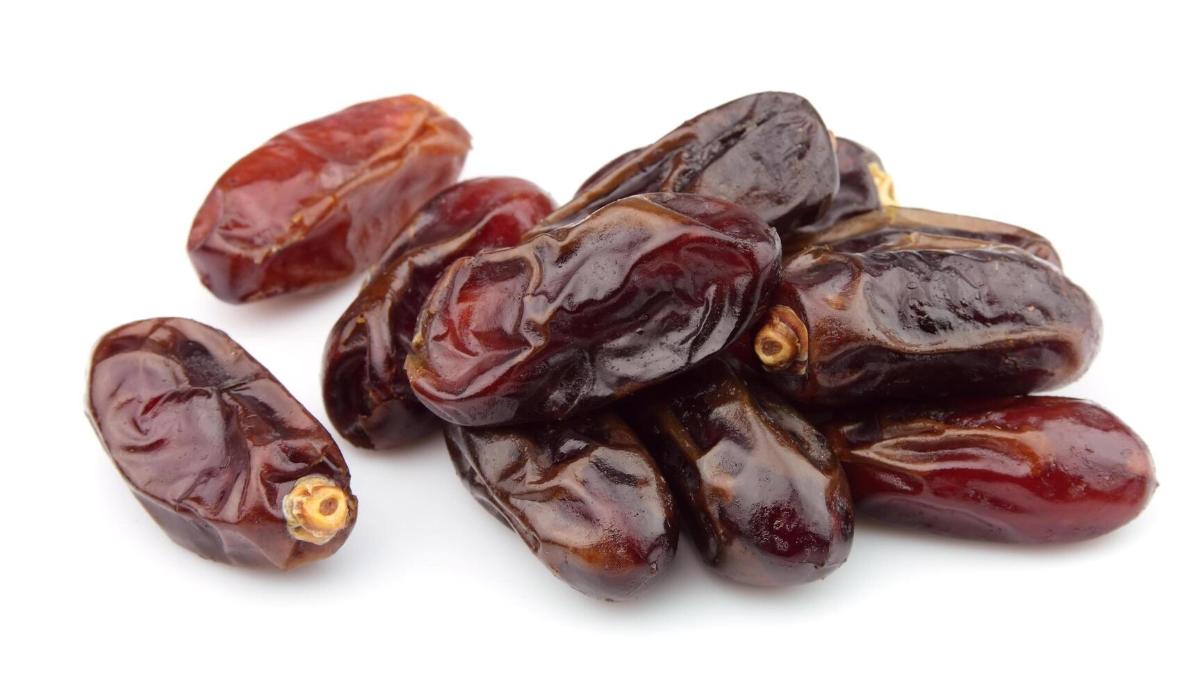 Dried dates on white photo