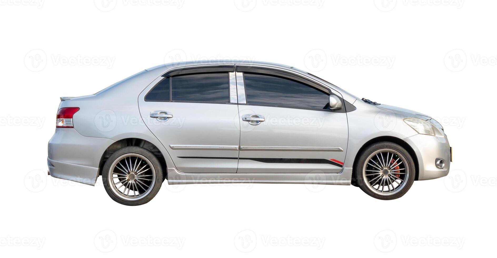 Side view of bronze sedan car isolated on white background with clipping path photo