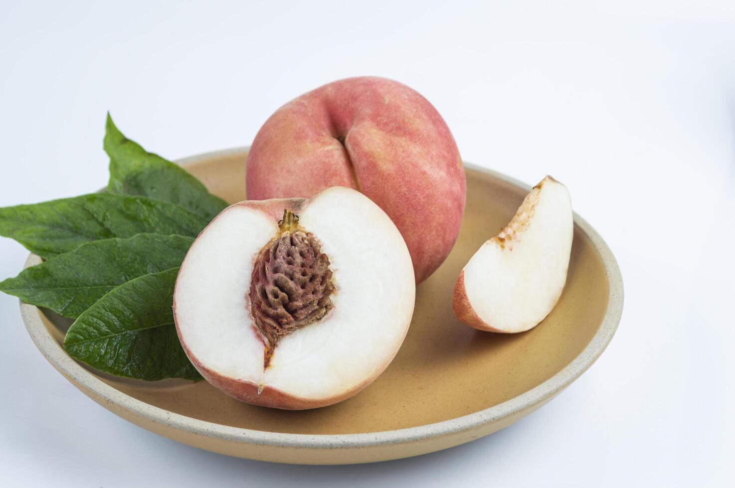 peach on white background photo