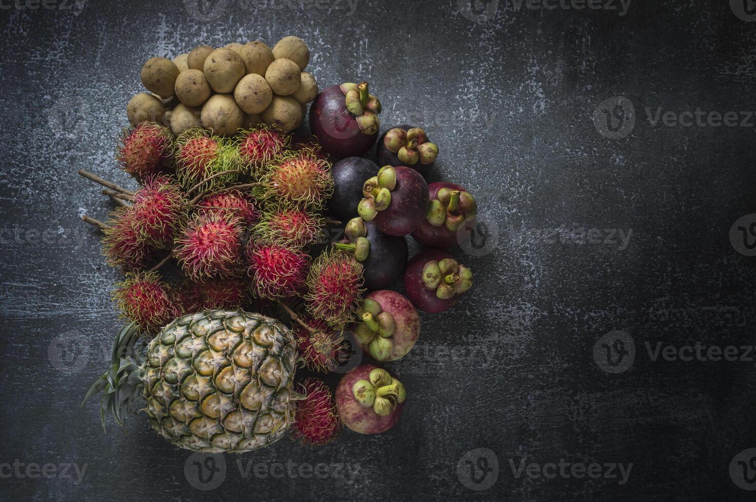 various fruits and vegetables on a black background photo