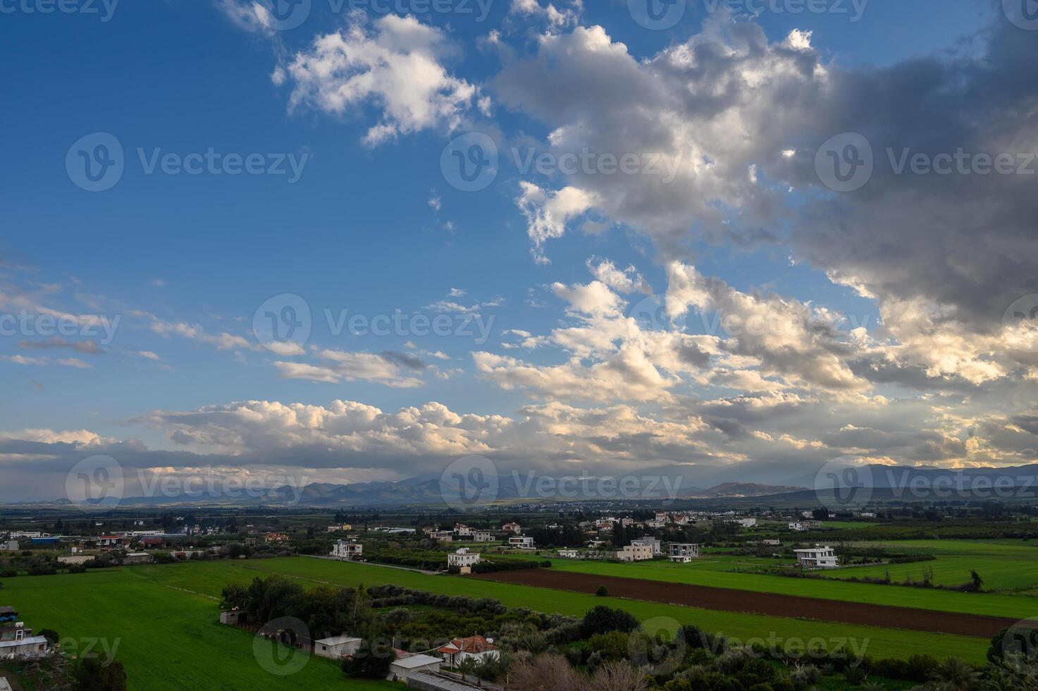 clouds over the village and mountains in winter in Cyprus 8 photo