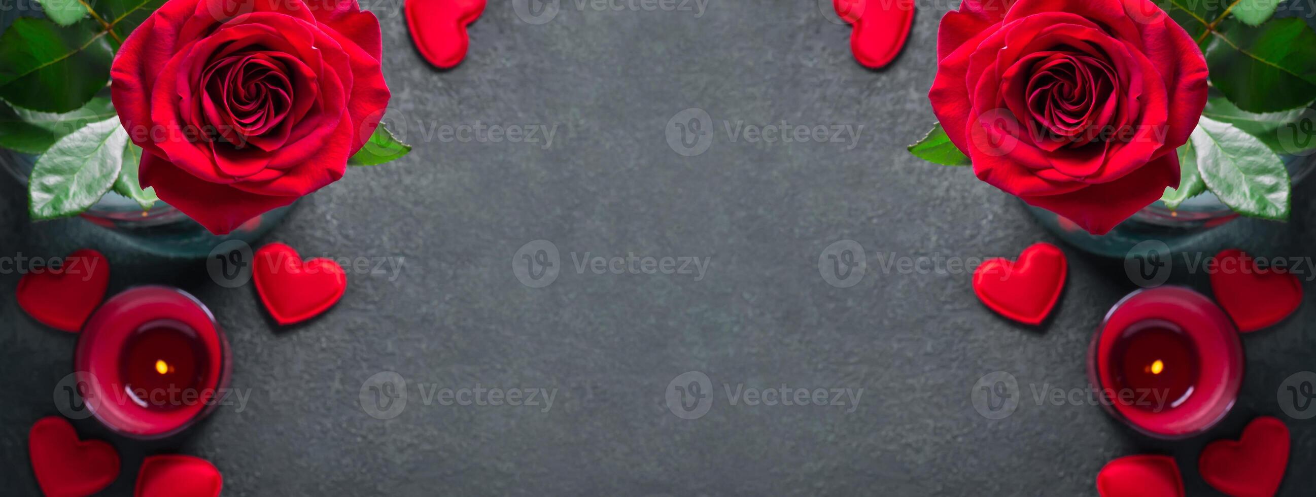 Valentines day concept. Red rose and candle on black background, banner format photo