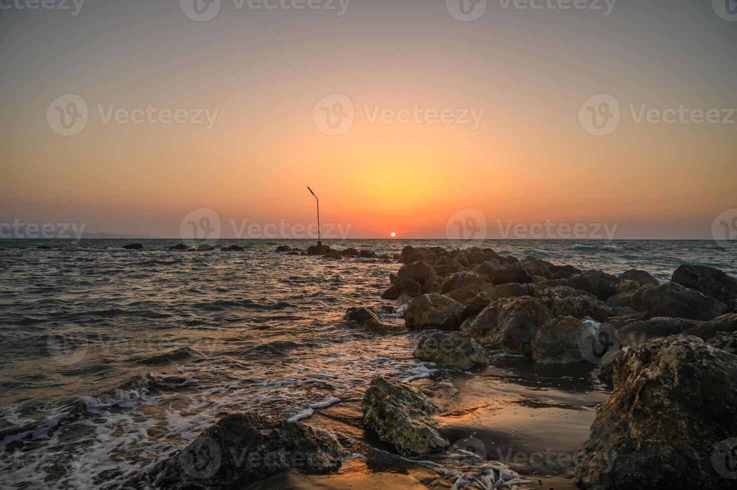 stunning sunset view of ayia napa sea caves in cyprus showcasing a serene mediterranean landscape photo