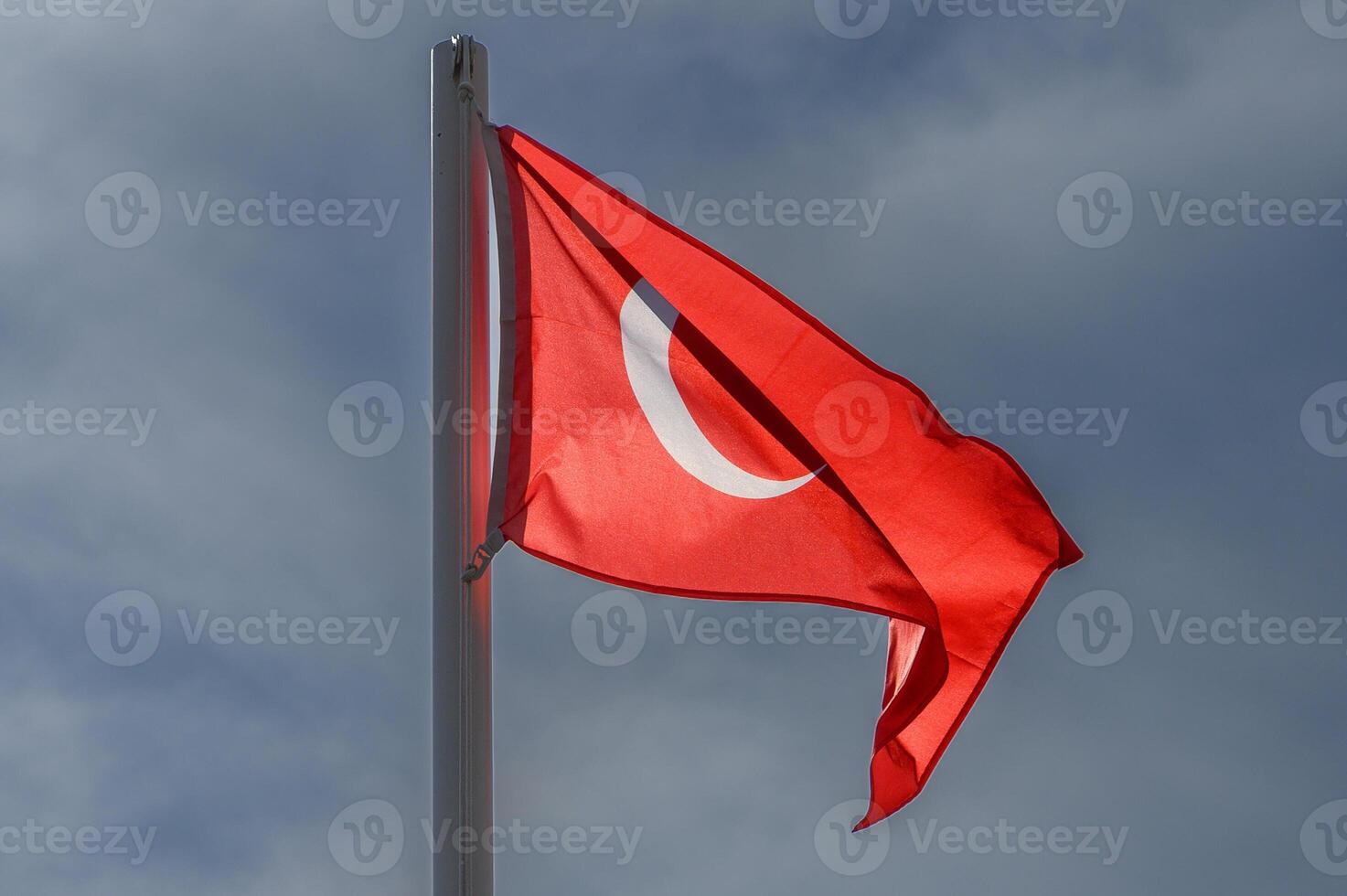 Turkish flag against the sky on a sunny winter day 1 photo