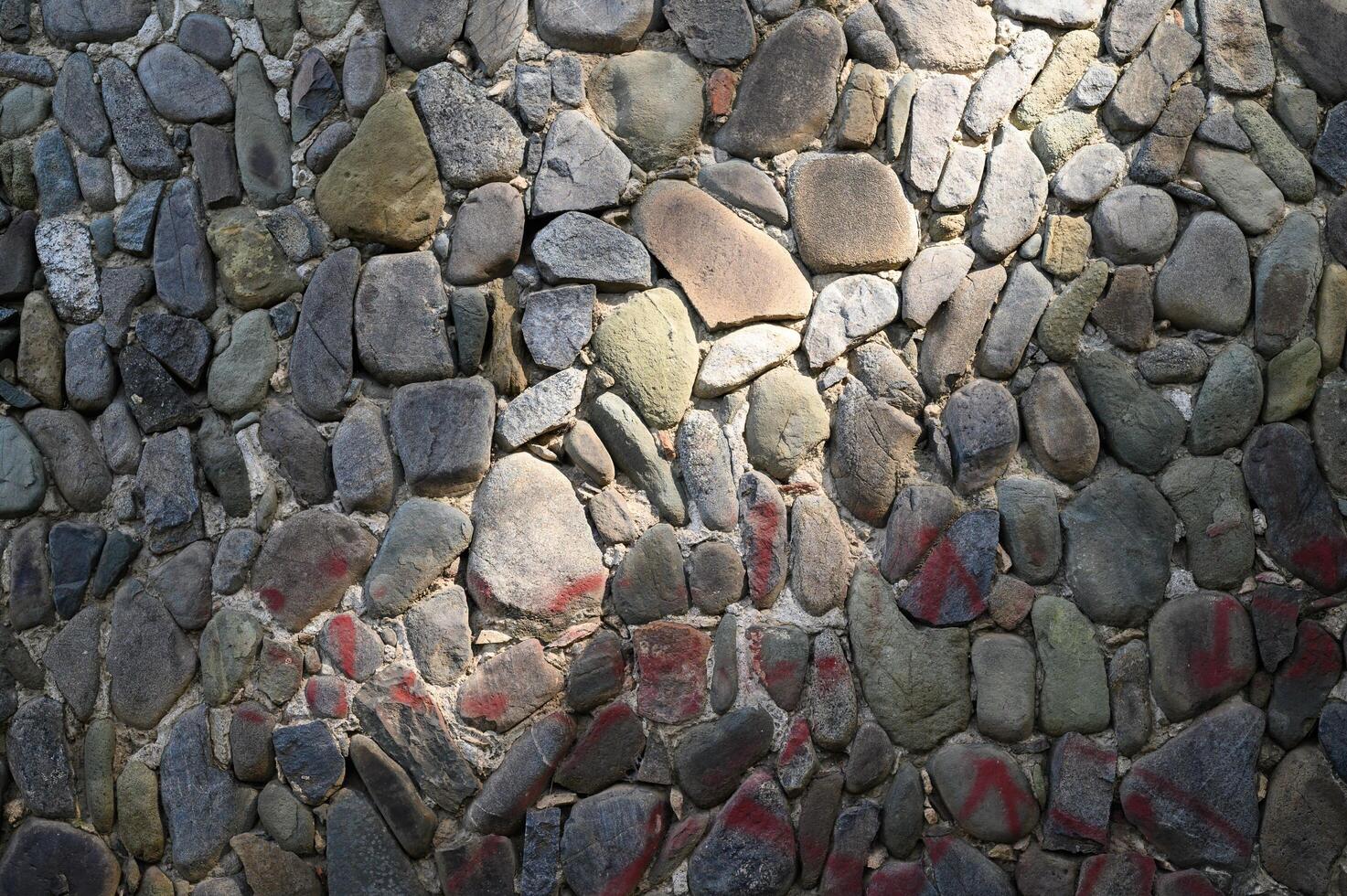 old wall made of real stone in the sun 1 photo