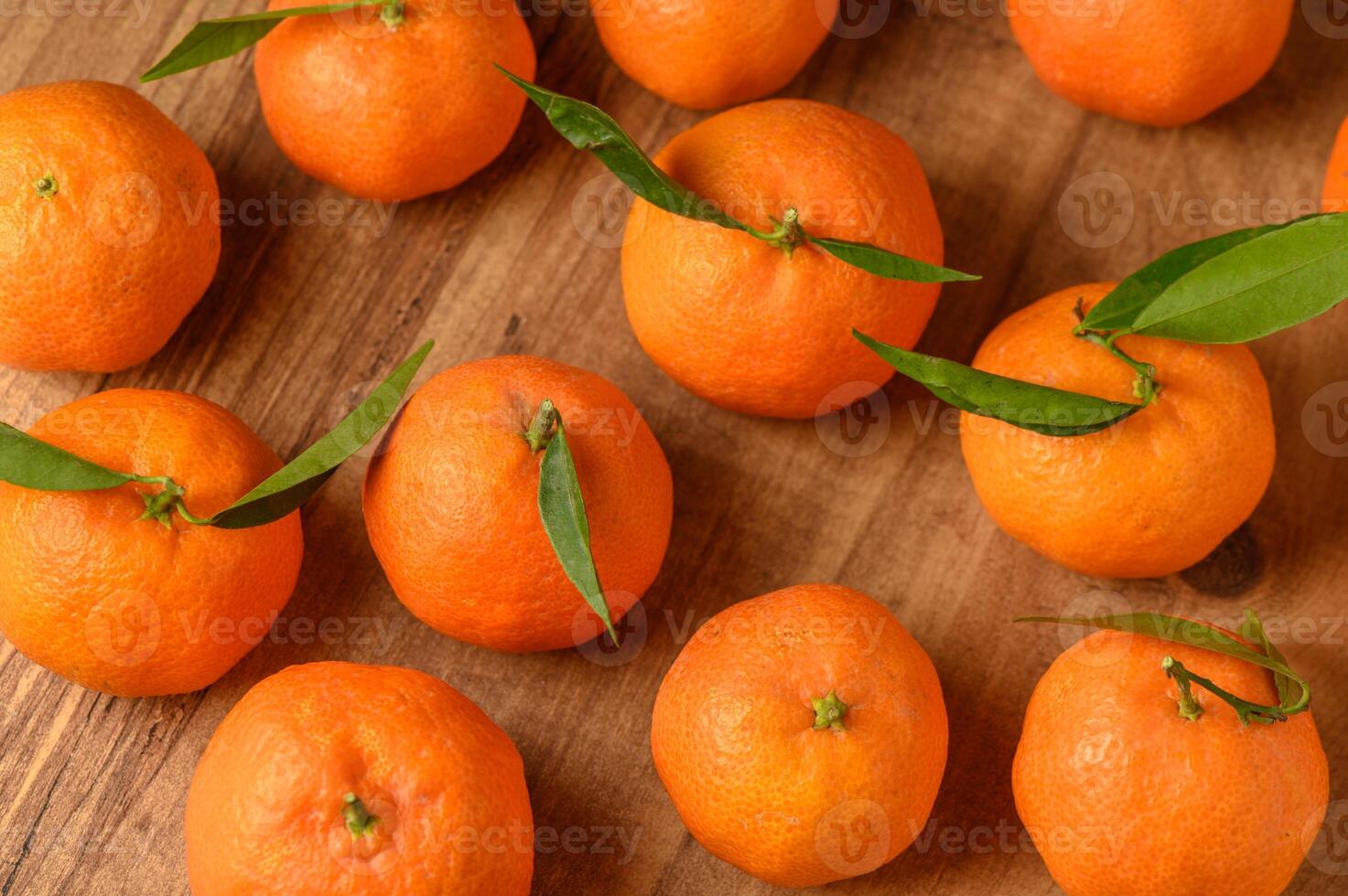 fresh juicy tangerines on a wooden table 16 photo