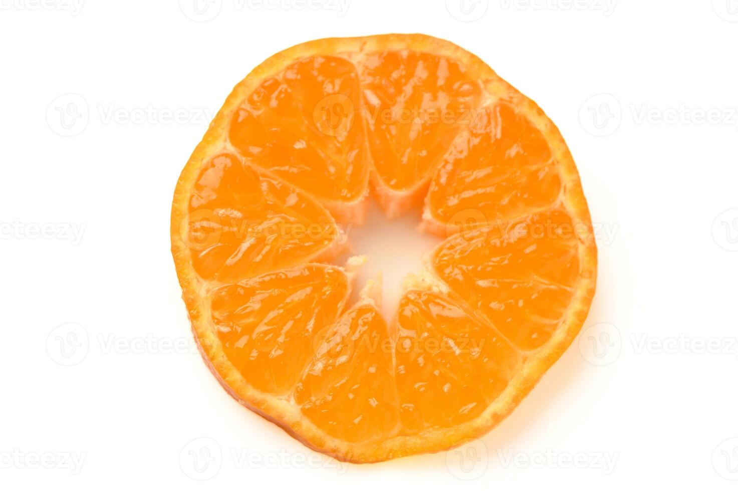 slice of juicy tangerine on a white background 1 photo