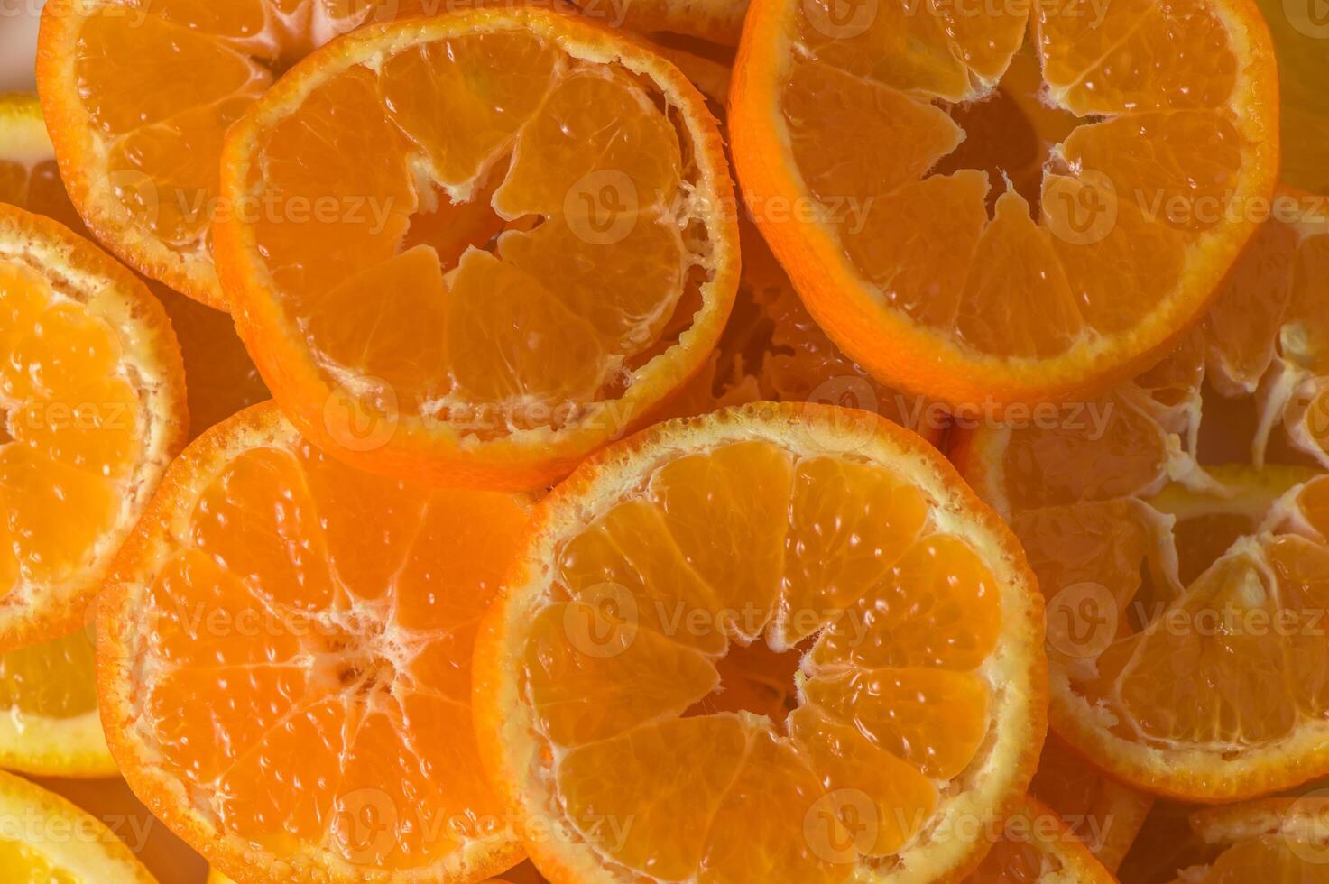 Slices of orange or tangerine . Flat lay, top view. Fruit compositio photo