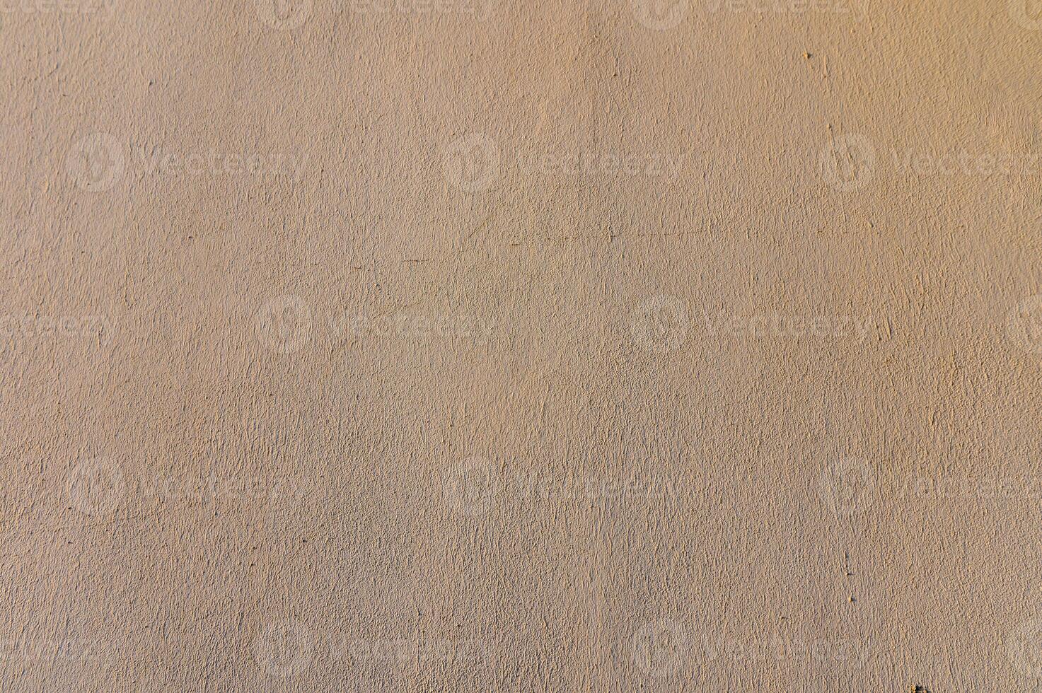 Texture and background of creamy white old cement wall photo