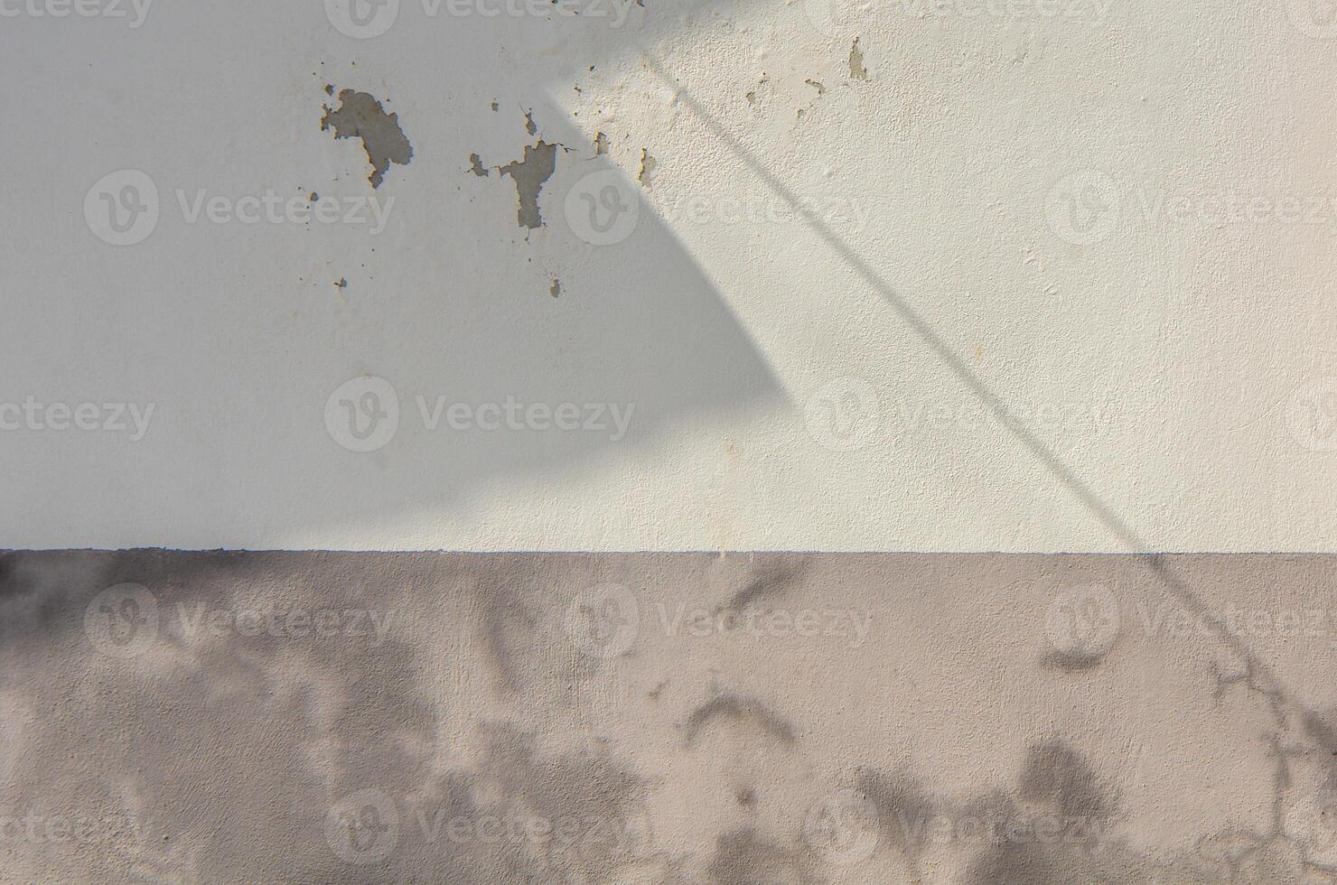 Sunshade shadow white plaster wall photo