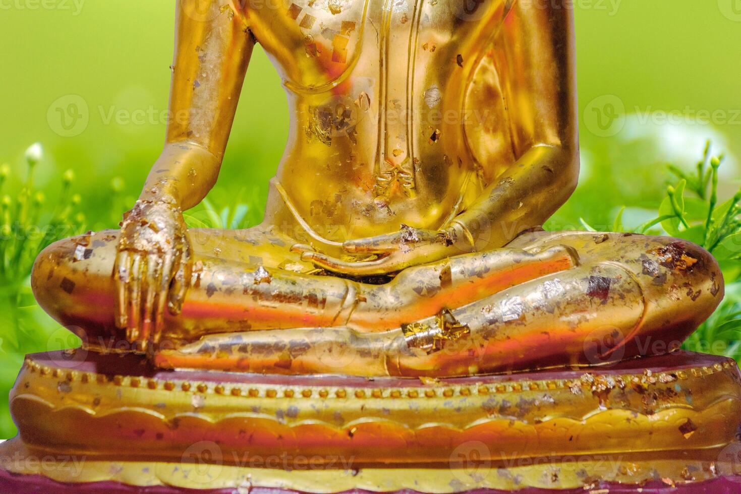 Buddha statue on white background photo