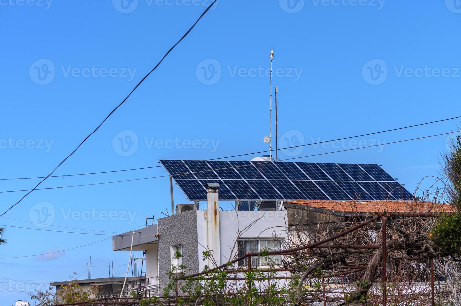 solar panels on the roof of a house in the village 2 photo
