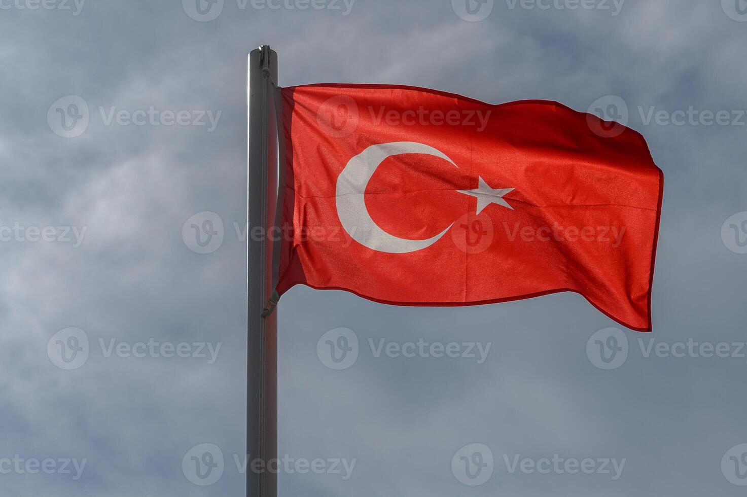 Turkish flag against the sky on a sunny winter day 13 photo