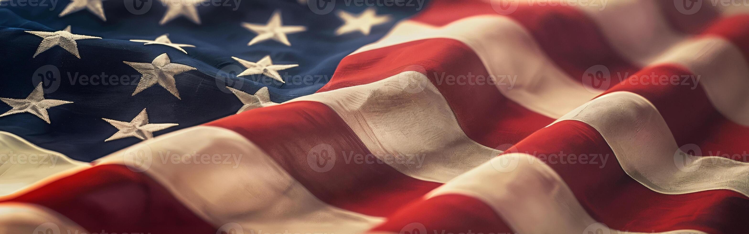 Close-up of the American flag, with its iconic red and white stripes and blue background filled with stars, symbolizing freedom and the USA in celebration or on landmarks day photo