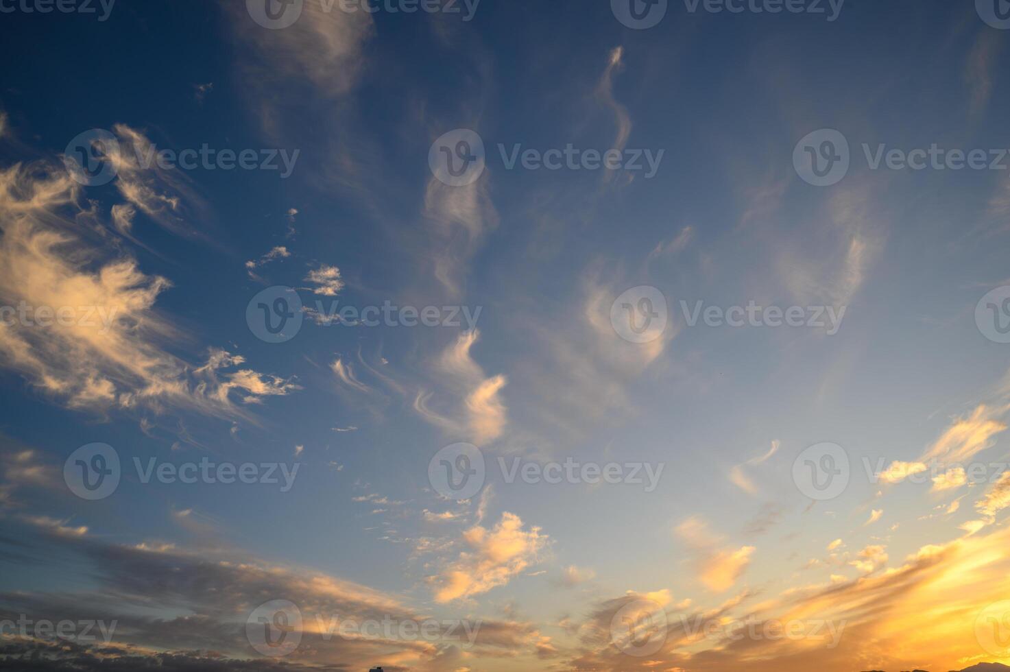 The gathering clouds during sunset create abstract painting patterns in the western sky. 1 photo