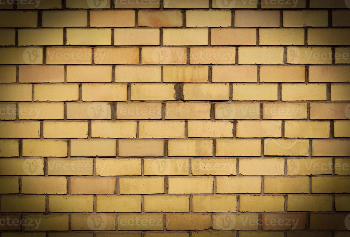 Yellow brick wall texture background, horizontal pattern photo