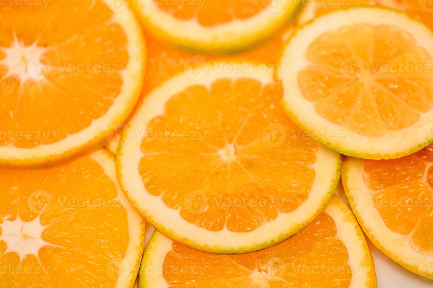 Sliced freshness orange fruit background. Round Pattern. photo