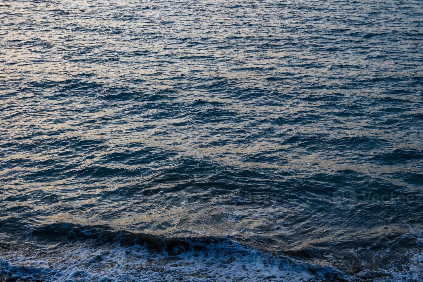 small waves on the Mediterranean sea during sunset 1 photo