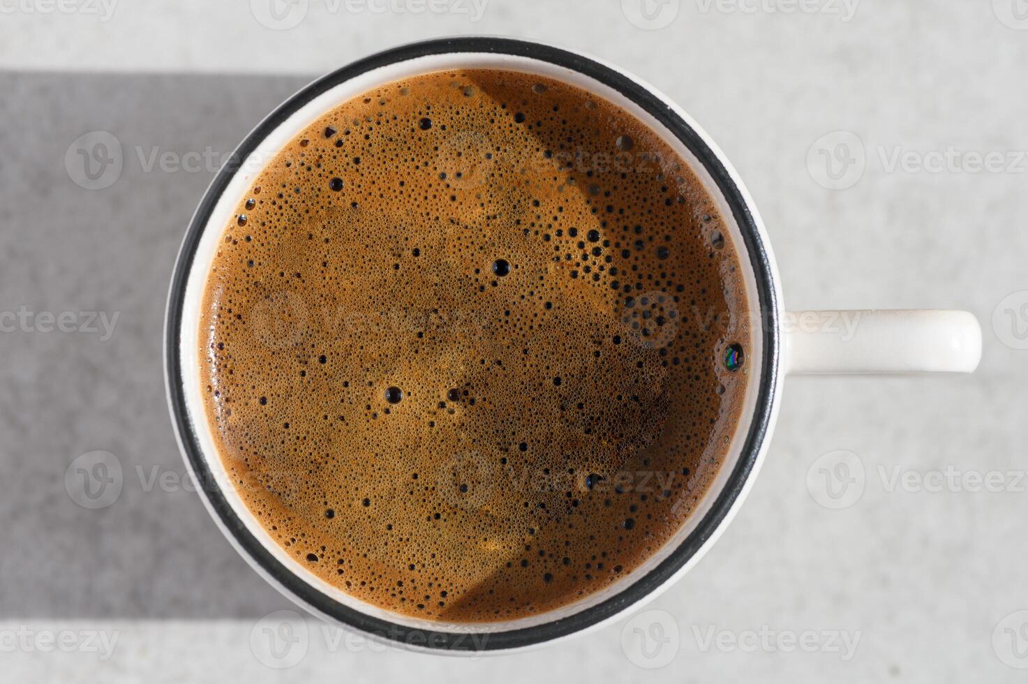 Top view traditional cup of Turkish coffee on an abstract background. photo