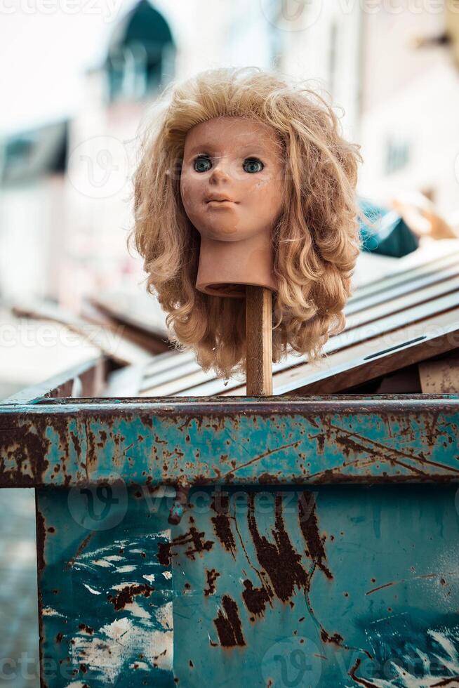 doll head is on a pole photo