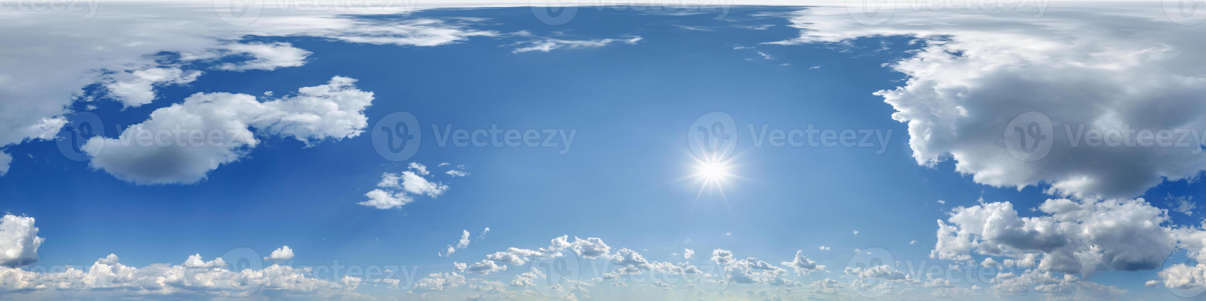 blue sky hdri 360 panorama with awesome curly white clouds with zenith for use in 3d graphics as sky dome or edit drone shot as sky replacement photo