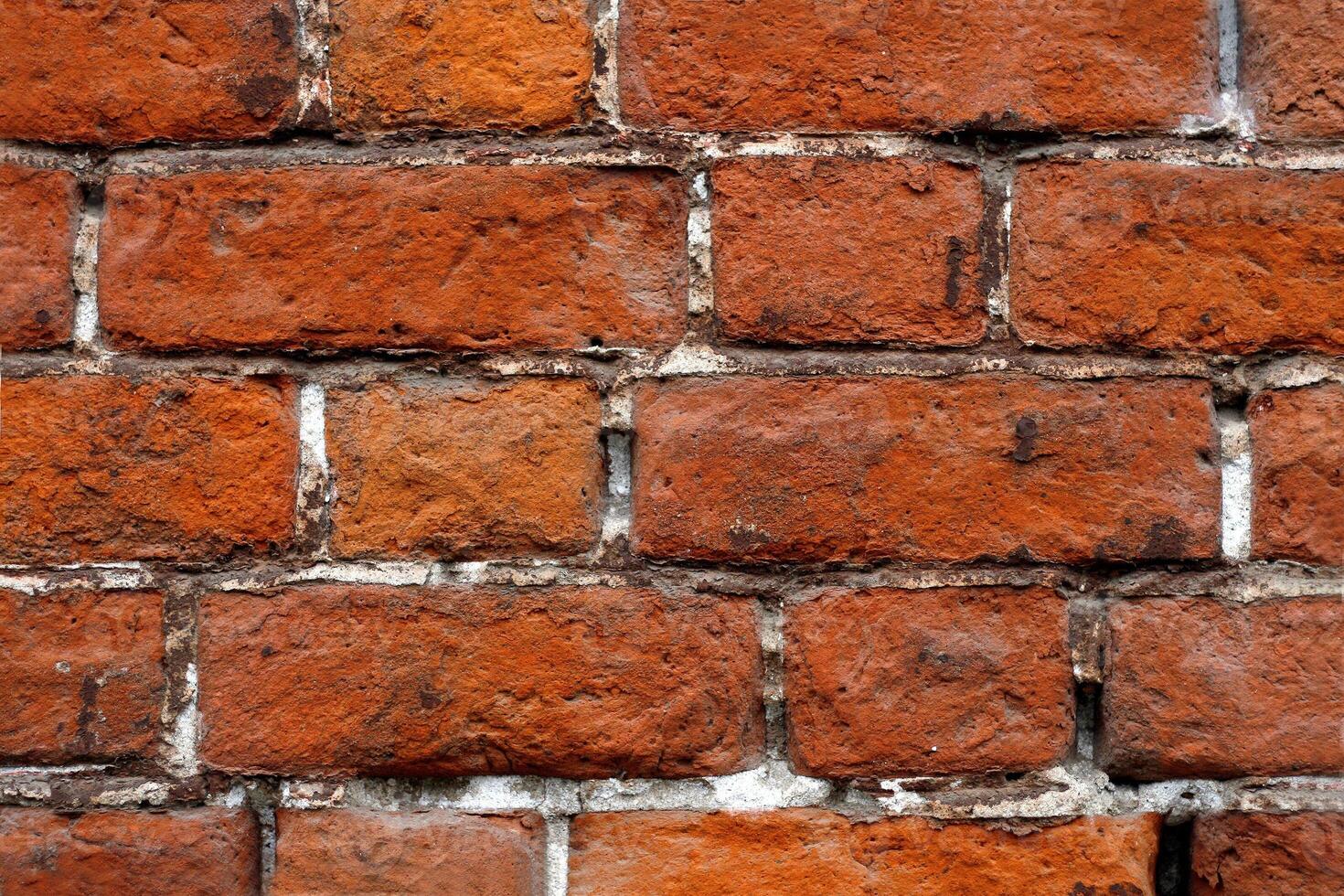 Very ancient brick wall texture photo