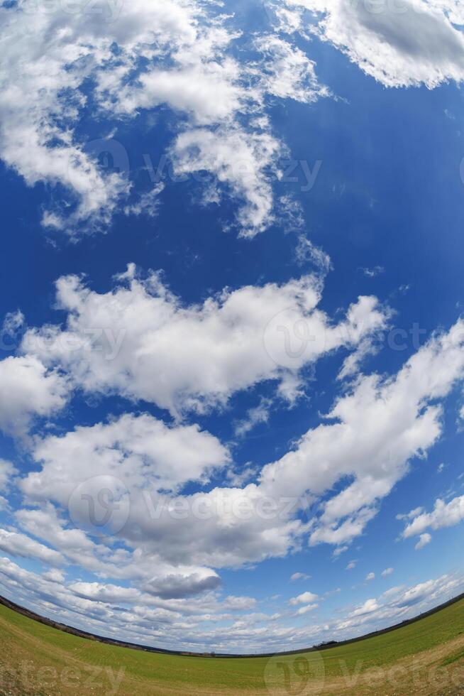 blue sky background with white striped clouds in heaven and infinity may use for skydome replacement photo
