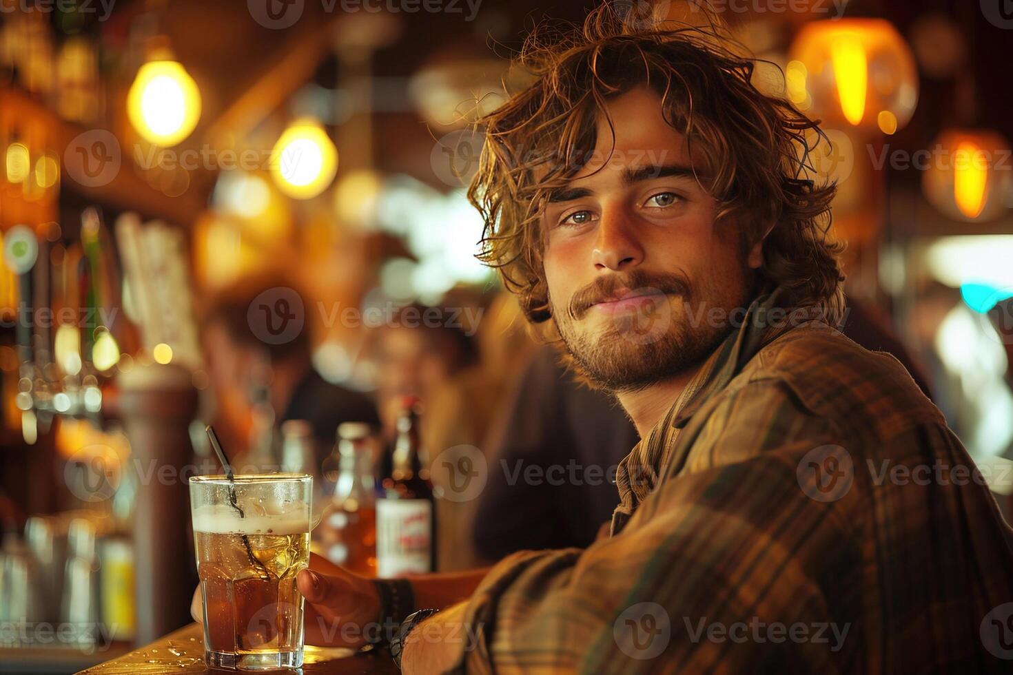 A man in a noisy bar sits at the bar counter with a glass of alcohol, relaxing close-up. photo