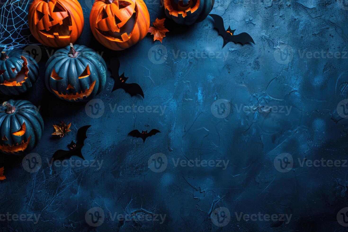 Halloween theme card with pumpkins and bats on dark background with copy space. Spooky scary holiday concept photo