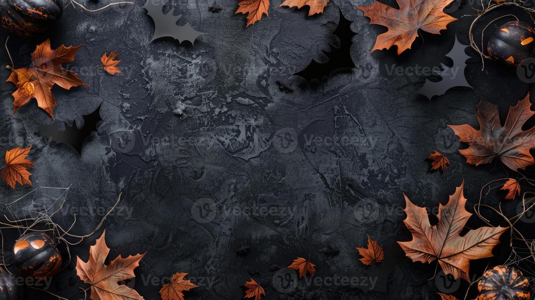 Halloween theme card with small pumpkins, bats and dried leaves on dark background with copy space. Spooky scary holiday concept photo
