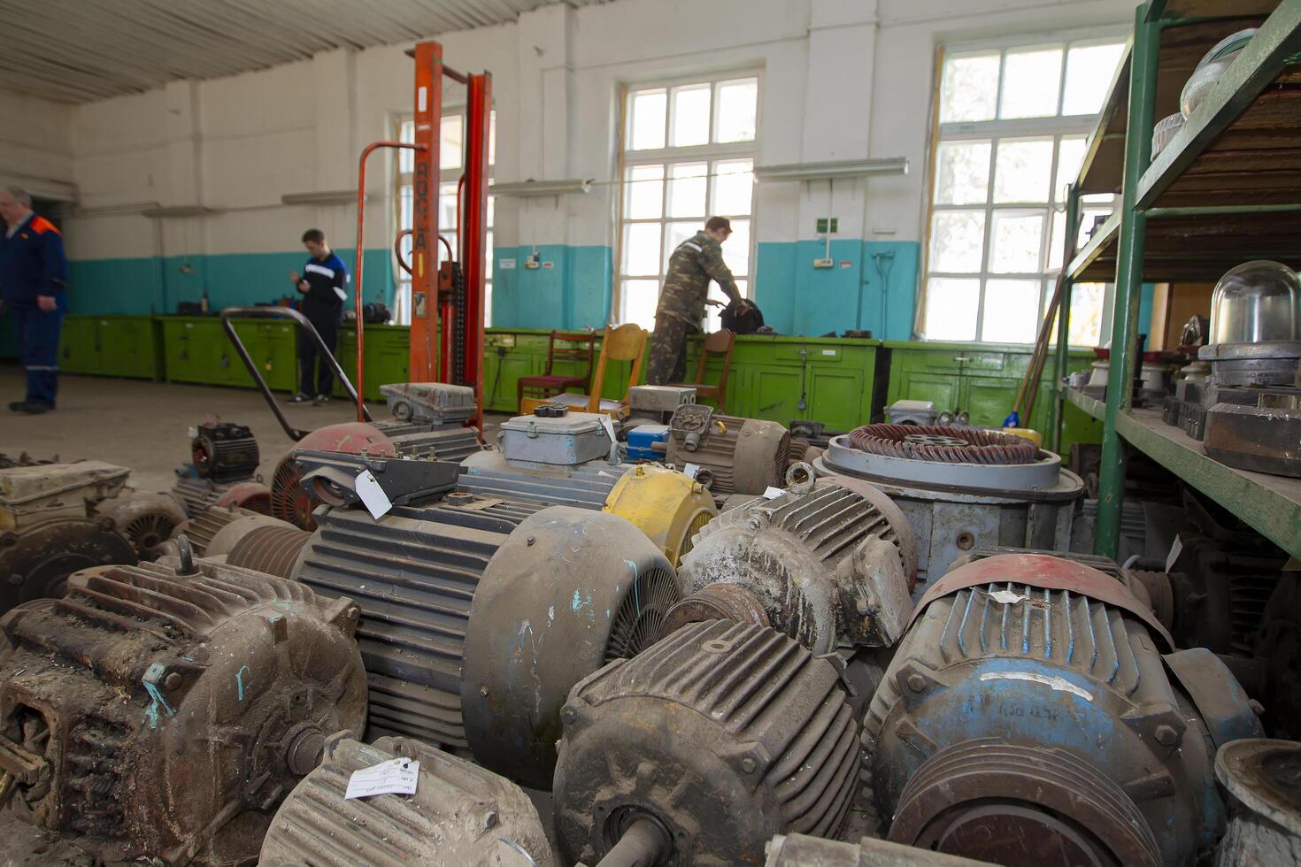Belarus, the city of Gomil, April 25, 2019. Wood processing plant. Old electric motors from industrial machines photo