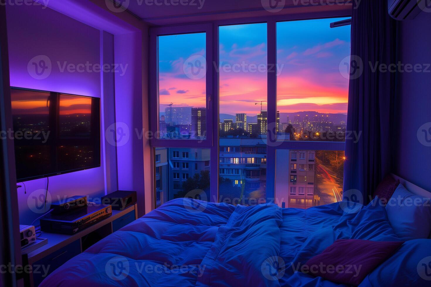 a bedroom with a lofi theme and a large window with the city at night photo