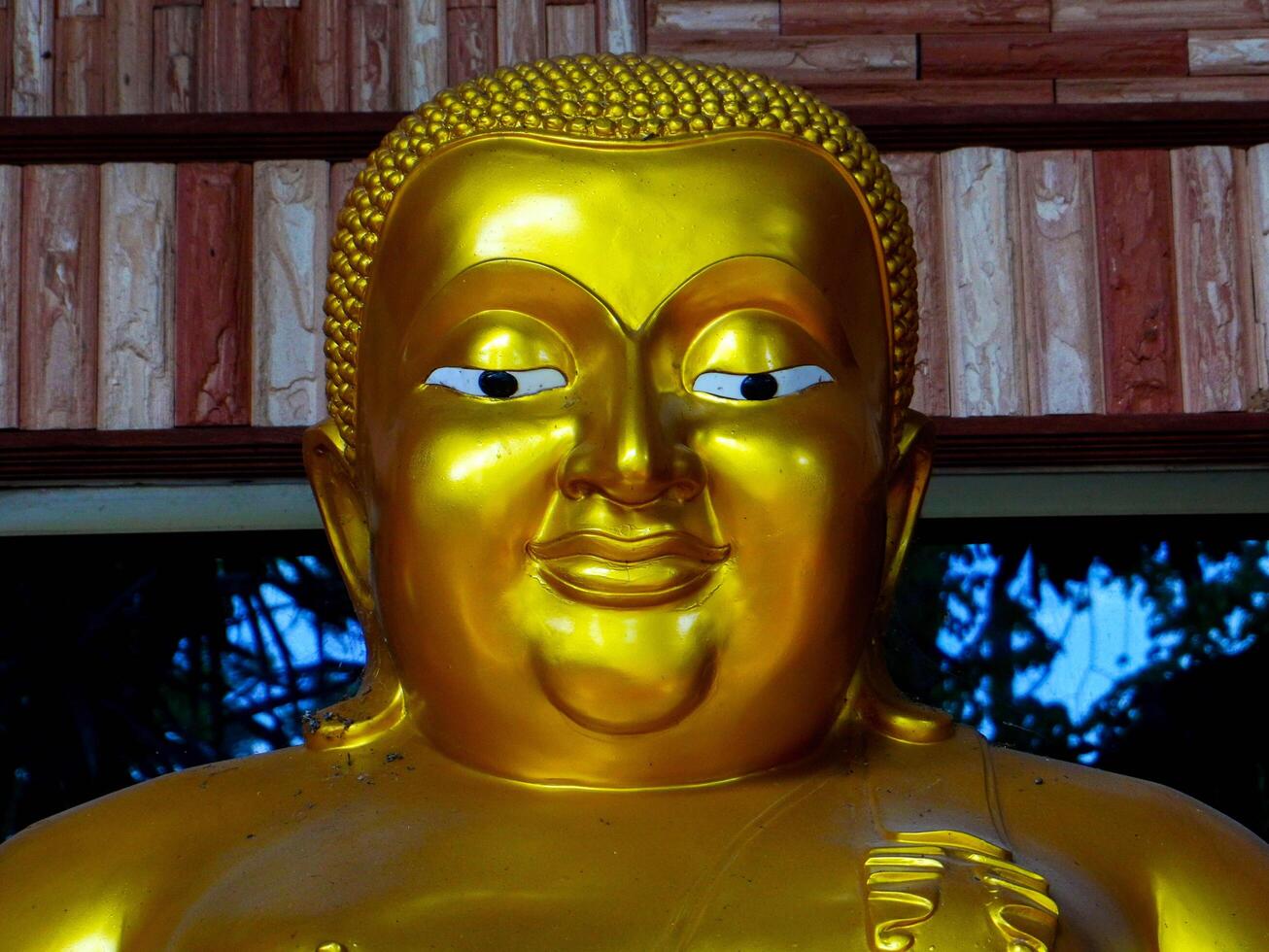 Buddha statues and sculptures at Phu Thok or Wat Chetiyakhiri ,Beautiful mountain landscape with rocky cliffs, Bueng Kan Province, Thailand. photo