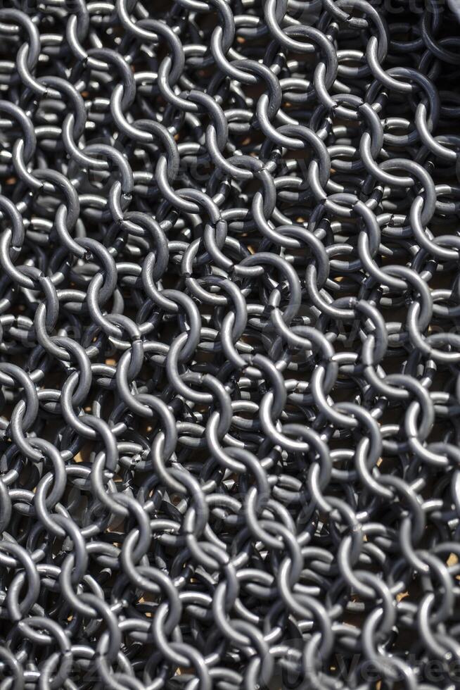 Vertical texture of metal chain mail photo