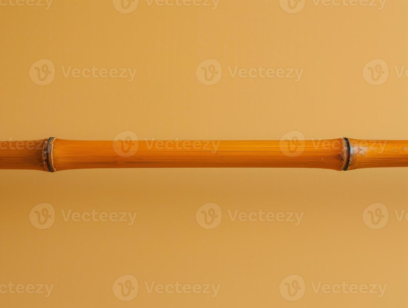 Single Bamboo Shoot on Yellow Background. photo