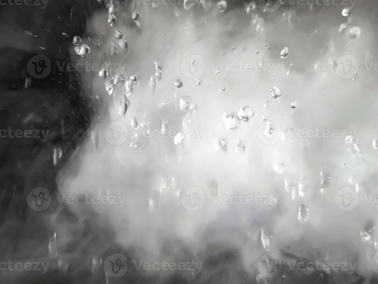 An Abstract Image of white steam with water droplets as background. photo