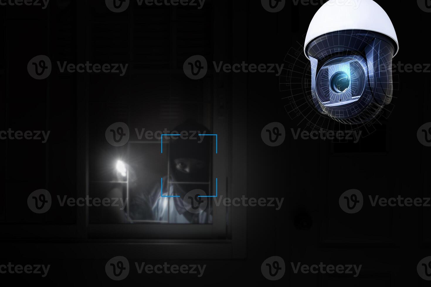 Thief use crowbar break into a house at window being caught by CCTV, surveillance camera. photo