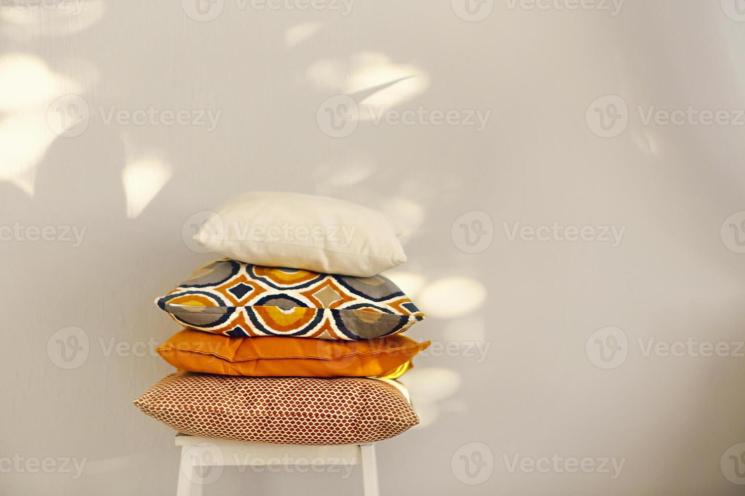 Colorful pillows on the chair photo