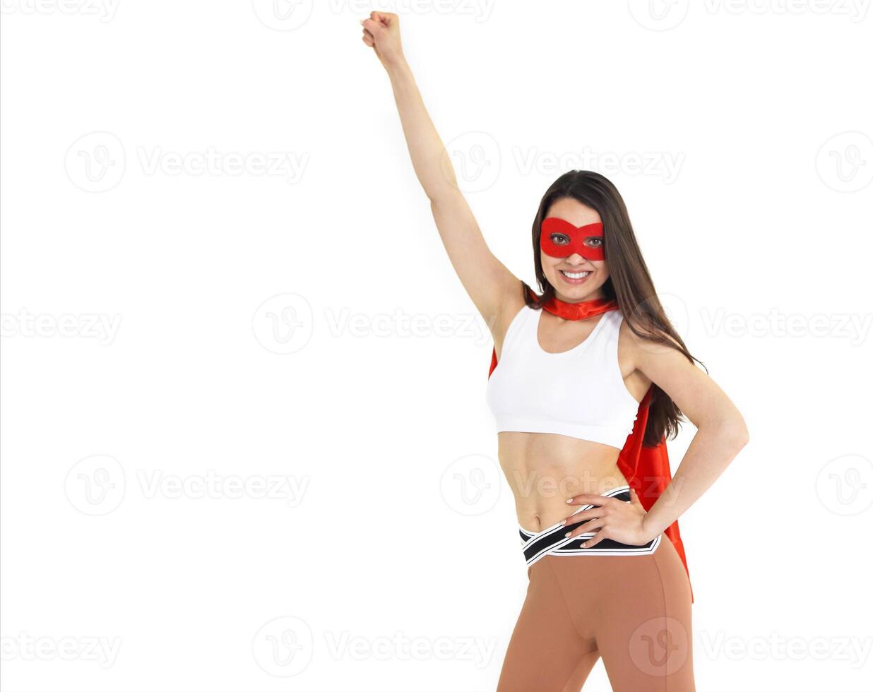 Young superwoman wearing sport clothes photo