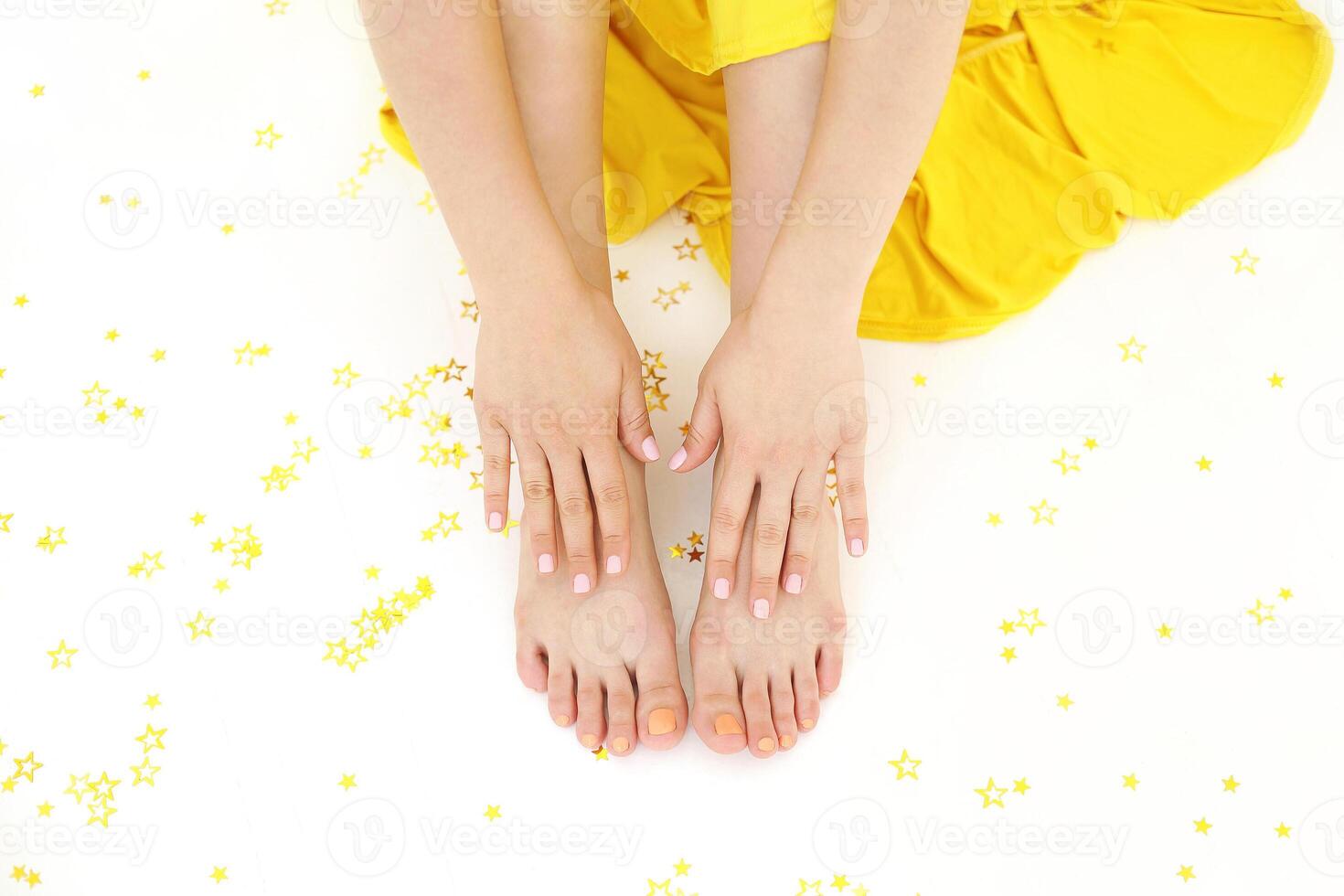 Crop woman with golden decorative stars photo